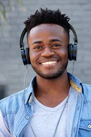 Close Up Cool Young Black Guy Listening To Music With Headphones ...