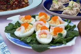 Filled eggs halves garnish with prawns and Swedish caviar Filled egg halves  Fyllda ägghalvor | Scandinavian food, International recipes, Swedish recipes
